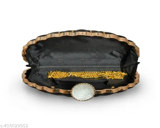 Black sequined clutch purse with gold accents