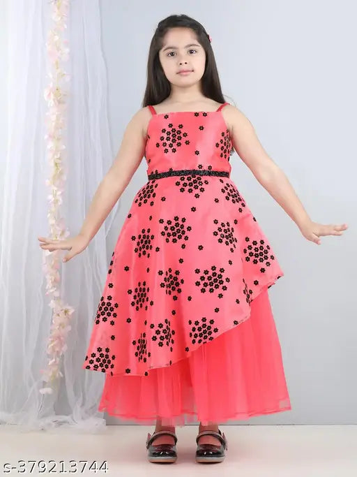 A bright pink, long-sleeved dress with floral dots designed for little girls, suitable for parties
