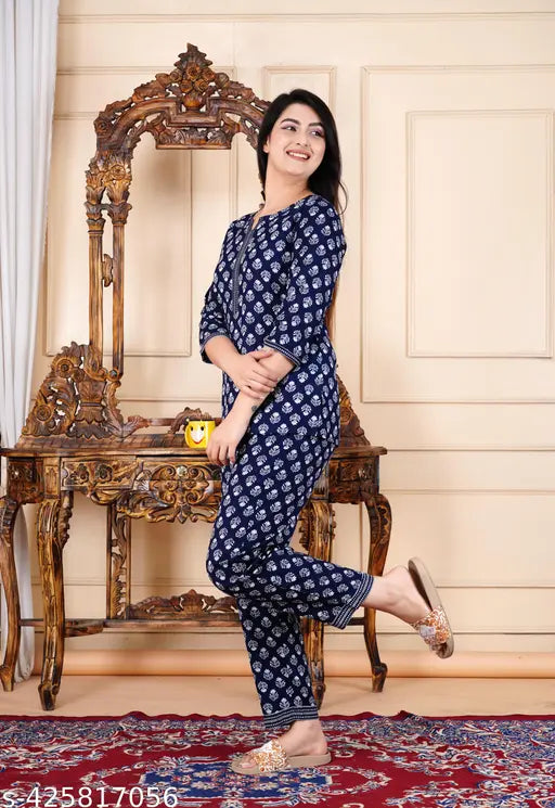Modern viscose rayon nightsuit with trendy printed pattern, three-quarter sleeves, and pyjama bottoms. India origin