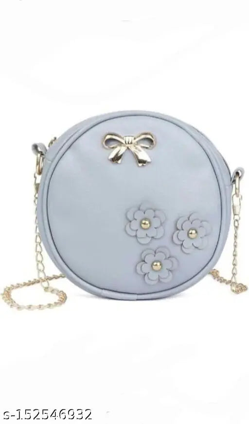 Pink and grey cross body sling bag with floral applique