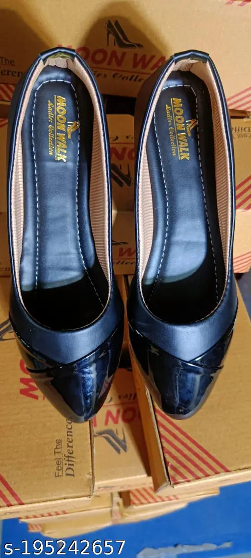 Black synthetic slip-on Moonwalk ballerinas bellies for women, featuring solid design with heels. Available in sizes IND-3 to IND-8 from India