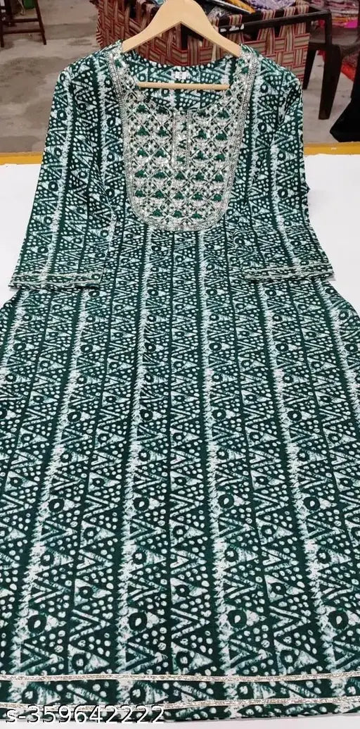 Green printed kameez dress with long sleeves, traditional design