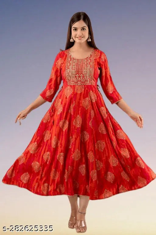 Orange rayon anarkali kurti with gold print, three-quarter sleeves, suitable for work