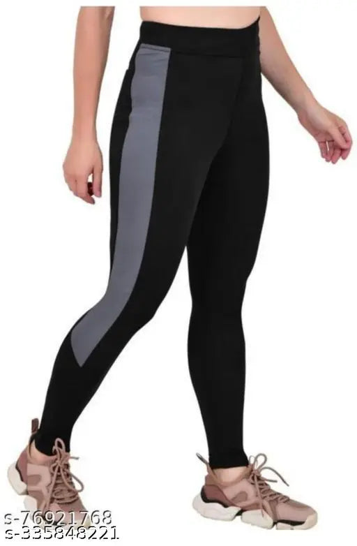 Multicolor striped cotton active tights for women, self-design net pattern, pack of 2. Ribbed bottom for support during workouts. Sizes: 28, 30, 32, 34 (35" length). Made in India
