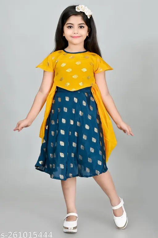 Little girl in a blue dress with a yellow sari