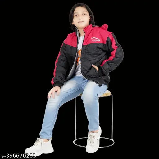 Boy in red jacket posing for photo