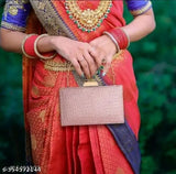 Pink metallic clutch handbag with chain strap