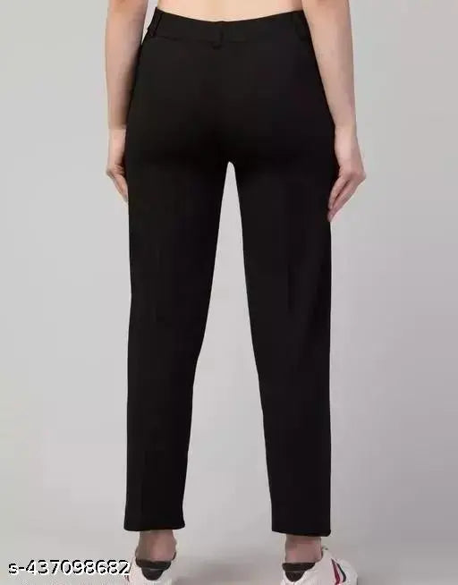 Black cropped high-waist pants, visible waistband pocket, women's fashion trousers