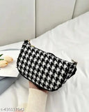 Black and white houndstooth sling purse with long strap