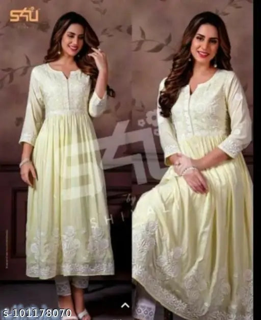 Vibrant Rayon Jaipuri Kurti set for women, showcasing intricate embroidery and three-quarter sleeves