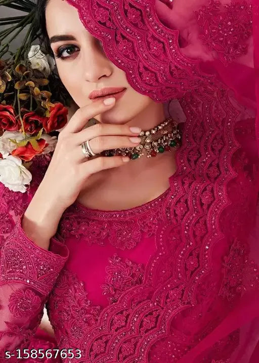 Embroidered lehenga set in net fabric with intricate designs, semi-stitched (44m waist, 42m length), originating from India