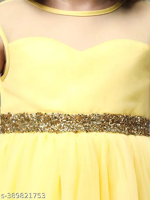 Yellow chiffon dress with gold trim, low waist, sleeveless