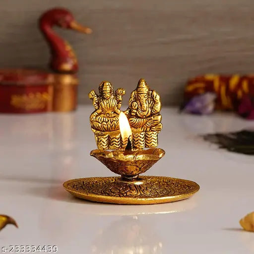 Antique gold plated metal Lakshmi Ganesh Hand Diya for home decorative showpiece, Indian-origin luxury item for housewarming or festive gifting