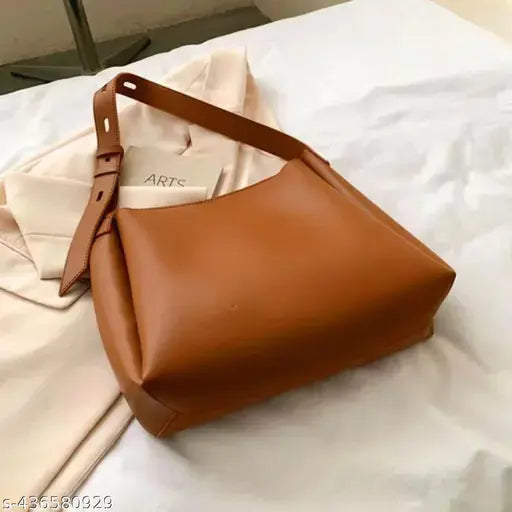 Tan leather tote bag with handles