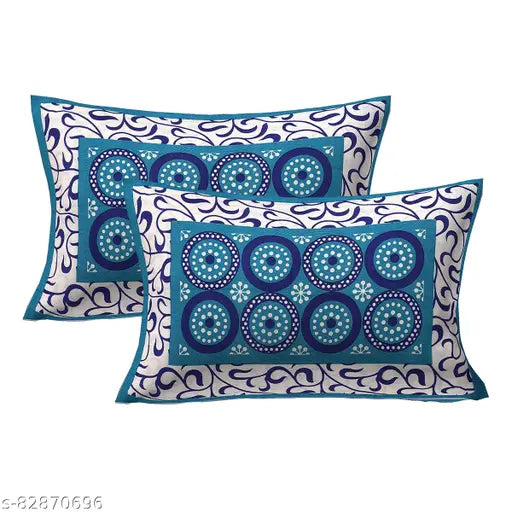Sea green cotton double bedsheet with abstract ethnic motifs, ideal for AC rooms, two pillow covers included