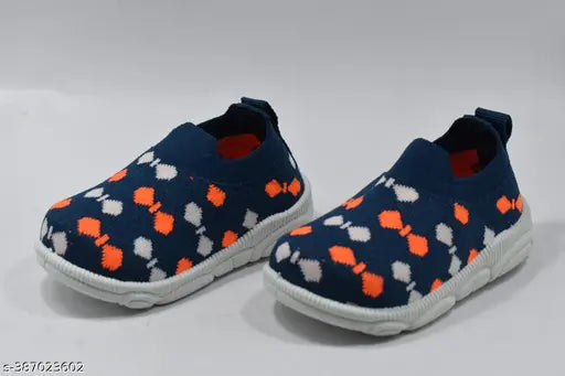 Blue, orange, and red patterned baby slipper