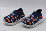 Blue, orange, and red patterned baby slipper