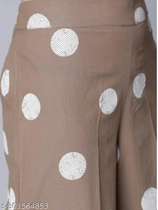 Women's cotton printed kurti pant set with palazzos, three-quarter sleeves, and vibrant pattern. Single size available in M (38in bust, 14.5in shoulder, 34in waist, 42in hip, 45in length), L (40in bust, 15in shoulder, 36in waist, 44in hip, 45in length), XL (42in bust, 15.5in shoulder, 38in waist, 46in hip, 45in length), XXL (44in bust, 16in shoulder, 40in waist, 48in hip, 45in length). Made in India