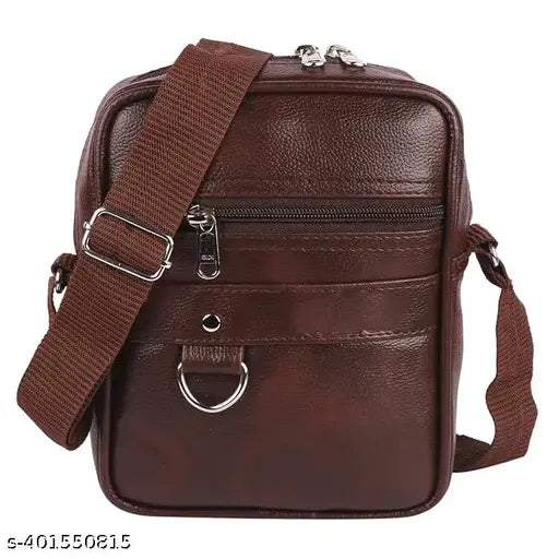 Brown leather sling bag with side strap, 1 main pocket and smaller front pockets