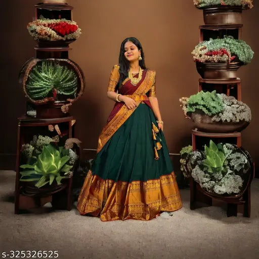 Traditional Indian Kanjivaram silk lehenga set with blouse, heavy jacquard jari work dupatta, colorblocked and zari stitched. Silk fabric, short sleeves, free size. Party wear for women