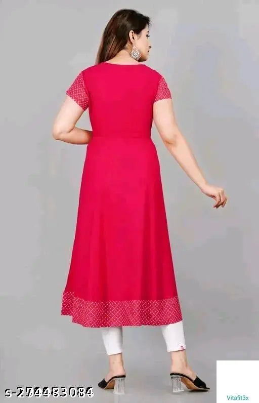 Bright pink embroidered kameez with white pants
