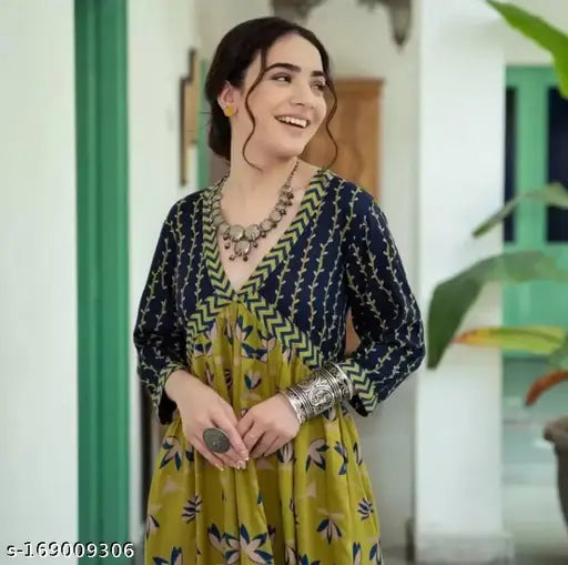 Stylish long anarkali kurti in a vibrant print with rayon material, suitable for ethnic wear and parties