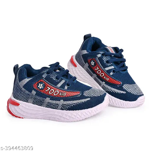 Dark blue canvas casual shoes with white sole, red accents, designed for kid's comfort, style and durability