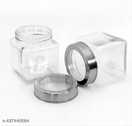 Clear, round, plastic jars set of 2 in a dark background