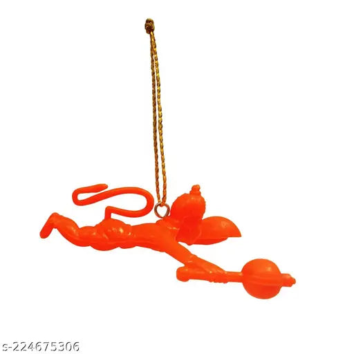 Red and yellow plastic toy of a man in a flying pose, attached to keychain with chain