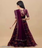 Organza and net kid's purple lehenga with floral embroidery, three-quarter sleeves, stitched net dupatta. Indian girls traditional wear