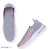 Pink and white women's casual sneakers with a sporty design