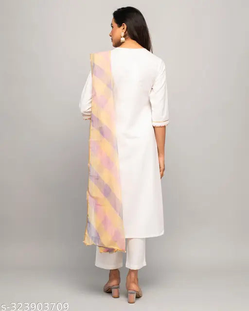 White cotton Fiorra A-line Kurta set with pant and dupatta, featuring chiffon bottomwear and three-quarter sleeves. Printed design on solid background. Perfect for any occasion. Pack of 3, sizes S-XXL, originates from India