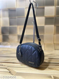 Trendy black women's sling bag with quilted design, adjustable strap