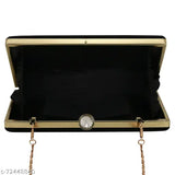 Handcrafted black clutch with shiny surface, designed to carry essentials