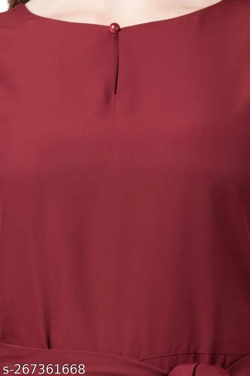 Solid maroon sleeveless crepe jumpsuit for women, modern fashion statement in vibrant red fabric