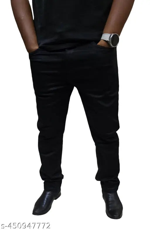 Black pants, standing against a solid background