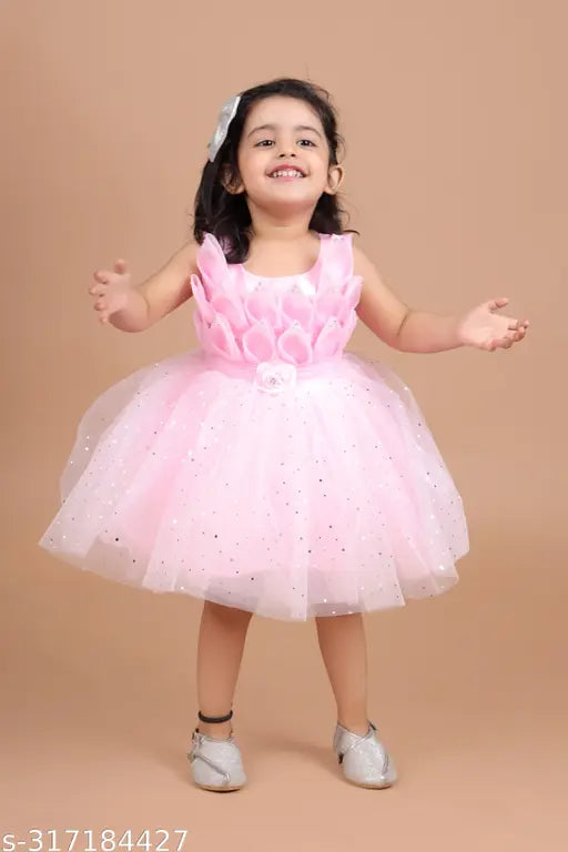 Vibrant pink midi knee length net party dress with grinning print, designed for kids' fashion