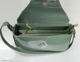 Lightweight slingbag with a short shoulder strap, suitable for girls. Featuring a smooth texture and a shiny, silky box pattern in a vibrant green color