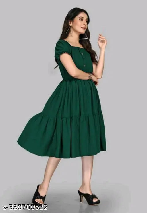 Green satin midi dress with ruffled sleeves, knee-length