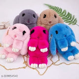 Multi-colored soft sling handbag featuring cute plush rabbit detail, ideal for girls' travel accessory