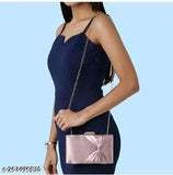 Metal clutch with a simple bow accent