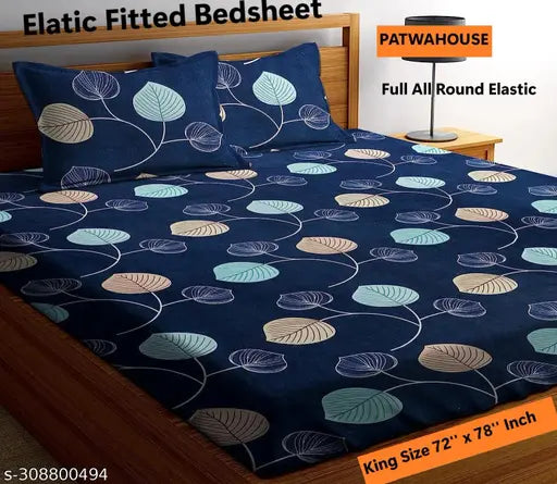 Glace cotton king-size fitted double bedsheet with geometric print, superfine and breathable, includes 2 pillow covers. Lightweight and easy to maintain for summer use. Made in India