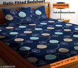 Glace cotton king-size fitted double bedsheet with geometric print, superfine and breathable, includes 2 pillow covers. Lightweight and easy to maintain for summer use. Made in India