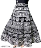 Long, ethnic-style skirt with intricate black paisley pattern and a high waist
