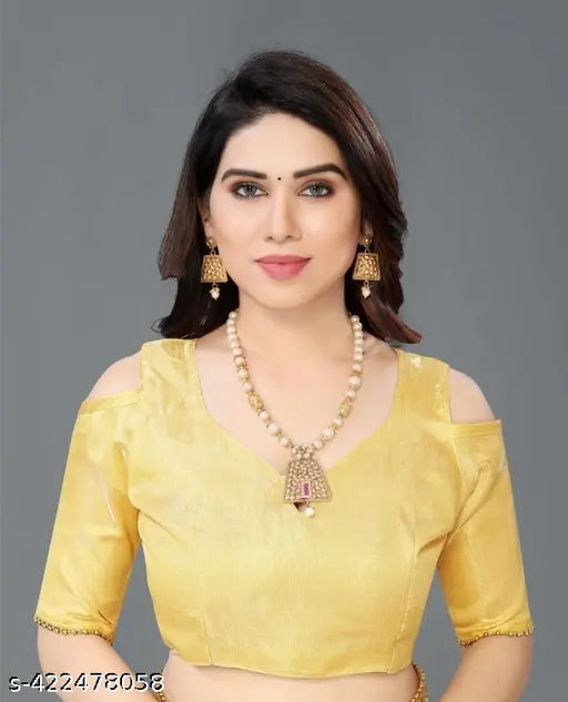 Gold and yellow sari with mirror embellishments by Banasari