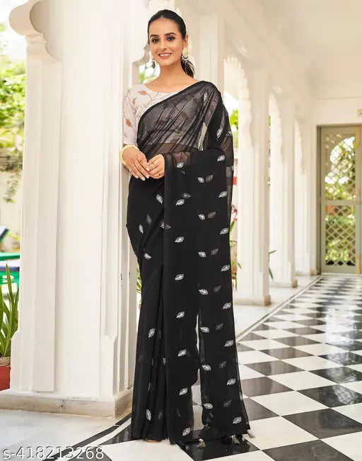 Black silk saree, sheer pallu, intricate botanical print, high-waisted blouse