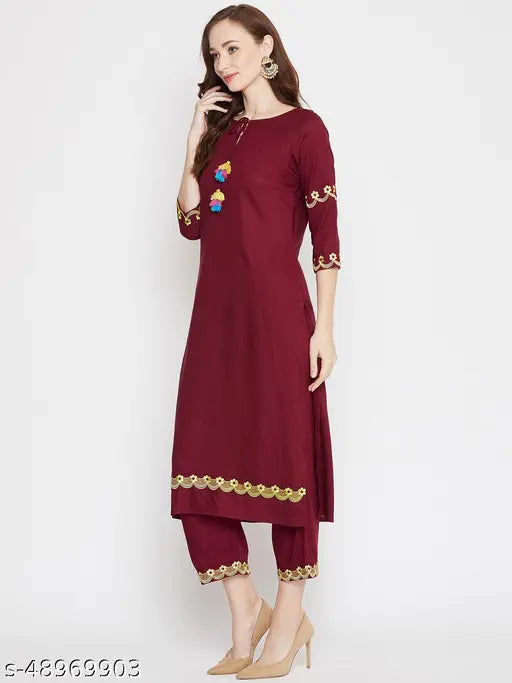 WineRed Embroidered Rayon Kurta and Palazzo Set, Indian traditional embroidered maroon women's outfit with three-quarter sleeves and matching palazzos, made from rayon fabric