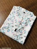 White cotton kurti with blue floral print, two buttons, casual wear.