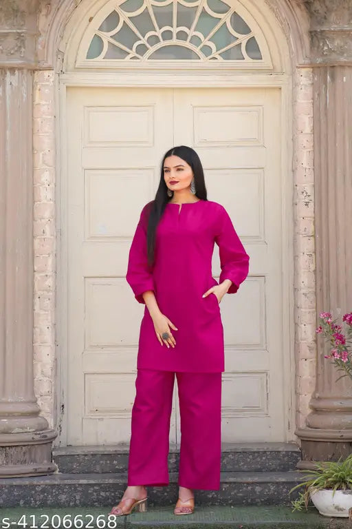 Cotton blend Rani color cord set, three-quarter sleeves palazzo with solid pattern for trendy casual wear, women's fashion in India