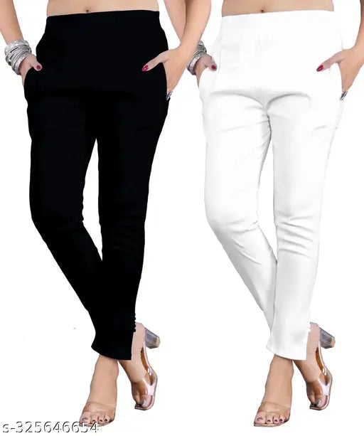 White and black jeggings, high waisted, cropped at knee length